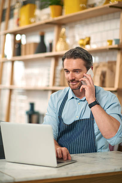 istock Handsome male barista making online order 508061100