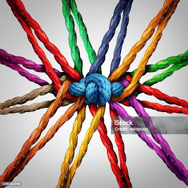 Group Holding Together Stock Photo - Download Image Now - Multiracial Group, Strength, Rope
