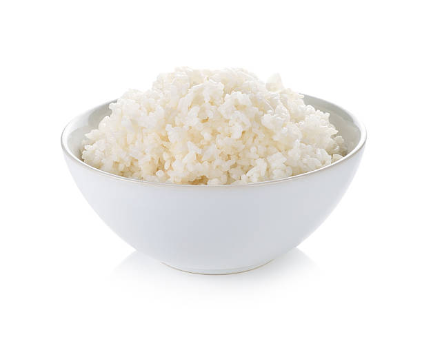 istock Rice in a bowl on white background 508062606