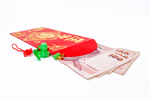 red pocket and lucky money on chinese new year : chinese text is mean rich gold and long live
