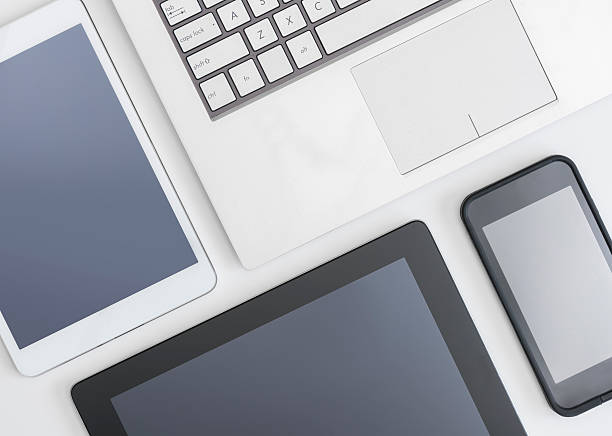 Flat lay photo of laptop, digital tablets and smartphone