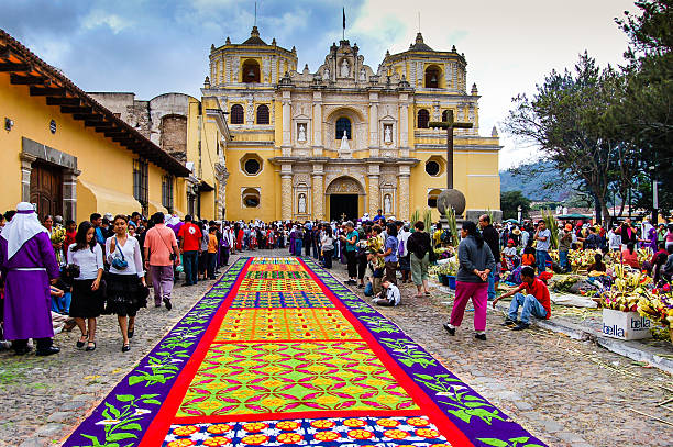 Antigua, Guatemala - April 1, 2007: Holy Week carpet (or alfombra) made in the path of a religious procession using wooden stencils and dyed sawdust, La Merced Church,