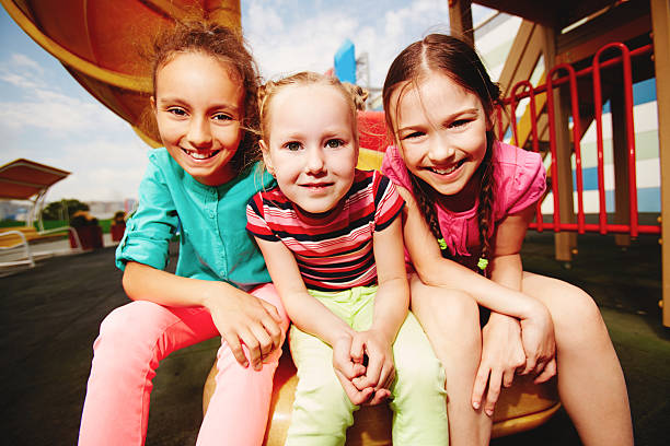 istock Girls in amusement park 508070714