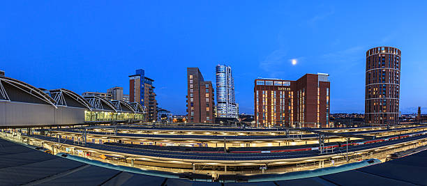Leeds panorama Leeds city skyline of modern architecture and rail tracks in the foreground, Leeds, England. leeds photos stock pictures, royalty-free photos & images