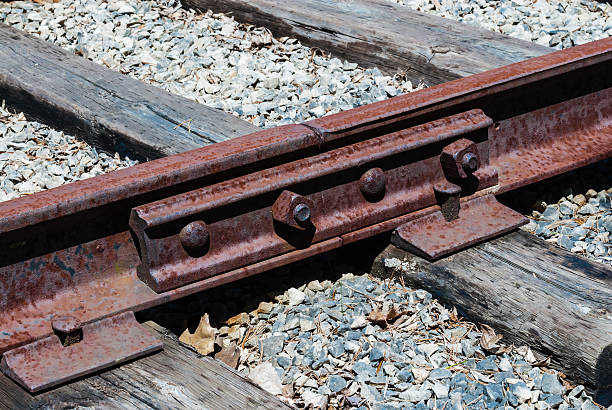 istock Rusted railway ties linked with bolts 508072529