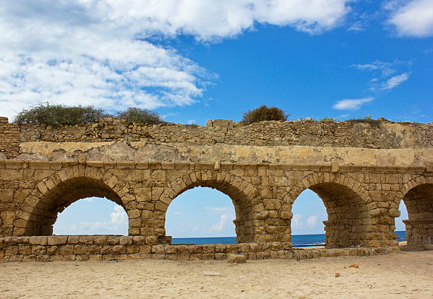 istock stone arches of ancient Roman aqueduct 508072647