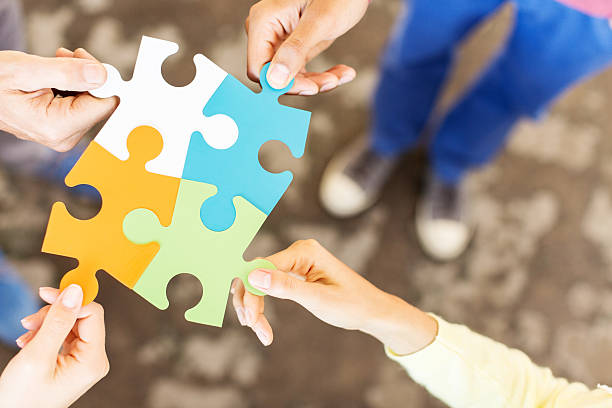 istock Business People Joining Jigsaw Pieces 508075657
