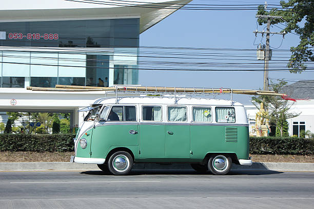 Old blue VW Transporter van without license plate parked on parking lot of second hand car seller shop in Bangkok Ladprao