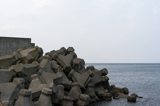 shakotan coastal line with tetrapods supporting the port area.