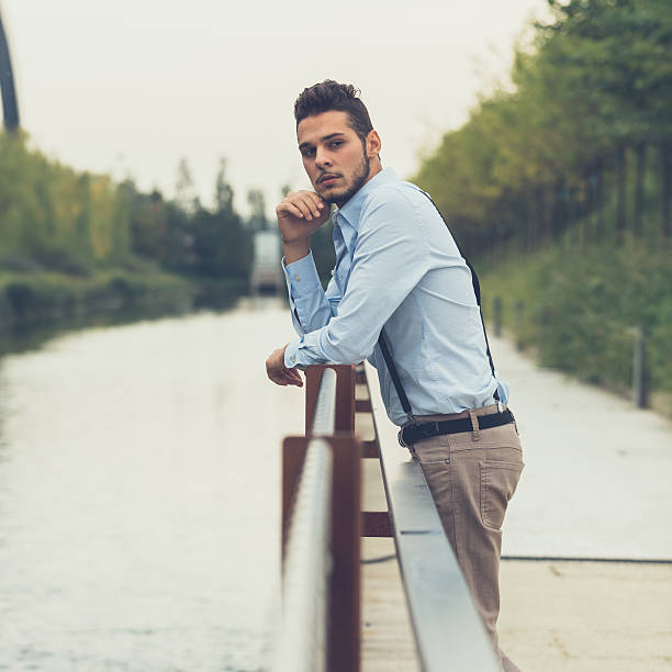 istock Young handsome man posing in an urban context 508094100