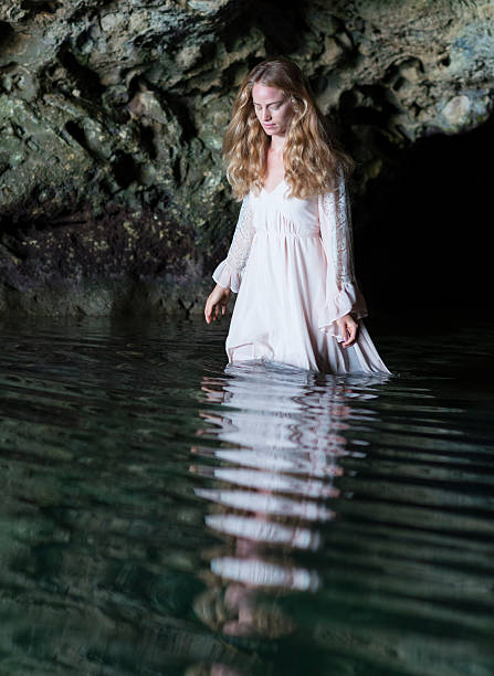 istock Young Woman In A Cave 508094719