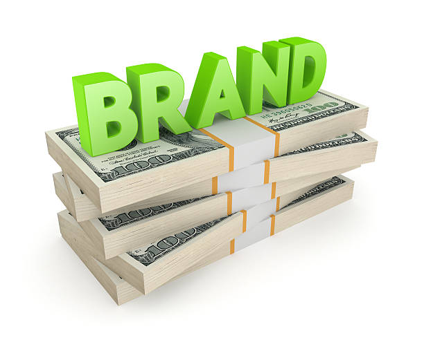 istock Word BRAND on a stack of dollars. 508094773