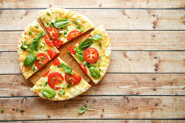 istock mouthwatering pizza with tomatoes, top view 508095267