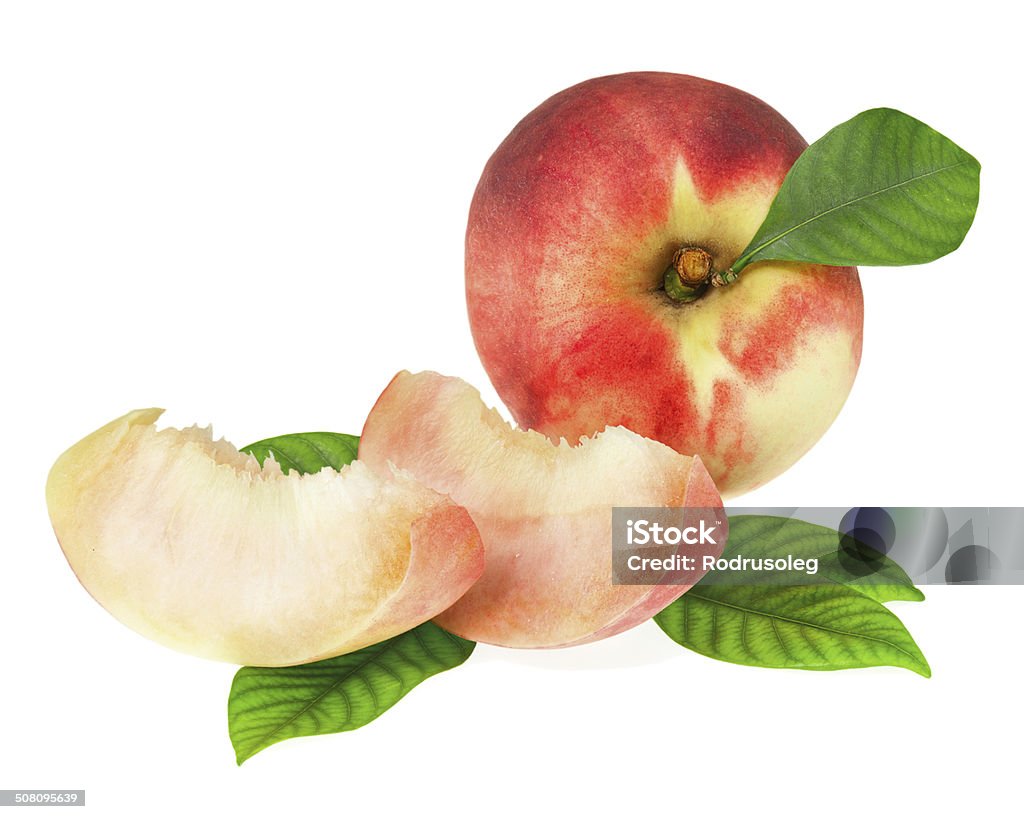 Fresh peach fruits with cut and green leaves isolated. Fresh peach fruits with cut and green leaves isolated on white background. Closeup. Close-up Stock Photo