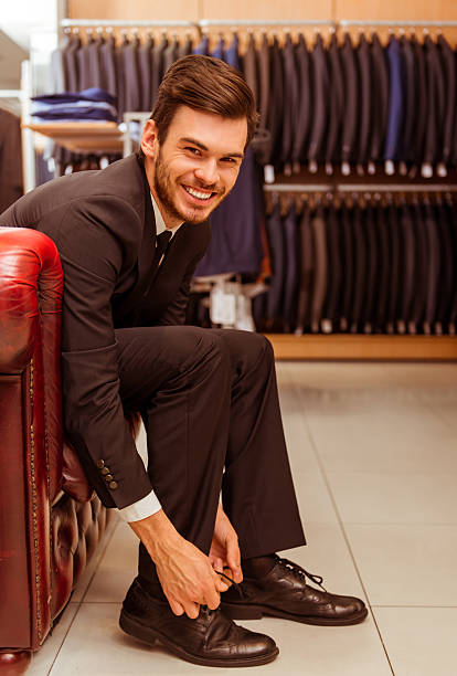 istock People in suit shop 508095822