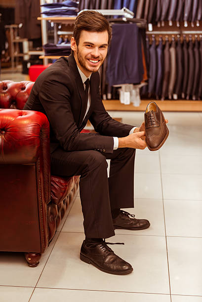 istock People in suit shop 508095900