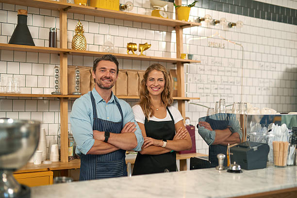 istock Two baristas working in coffee shop 508096178