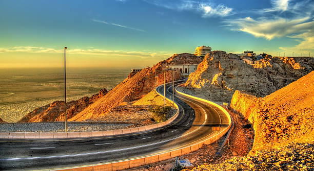 Road on top of Jabel Hafeet mountain in UAE Road on top of Jabel Hafeet mountain in UAE jebel hafeet stock pictures, royalty-free photos & images