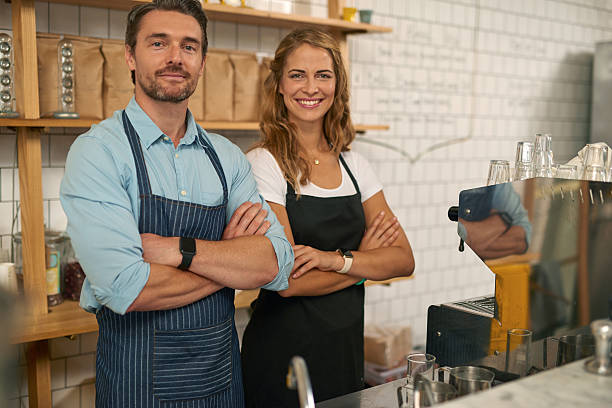 istock Two baristas working in coffee shop 508097338