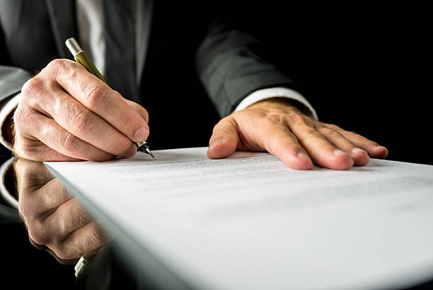 istock Businessman signing a paper document 508097865
