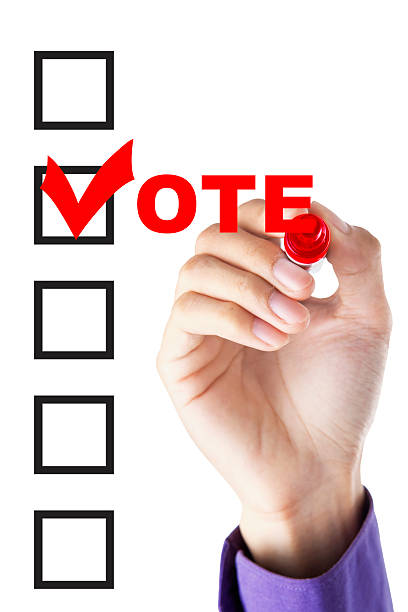 istock Male hand fill a voting form 508098476