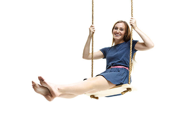 istock Cheerful woman swinging & looking at camera 508099075