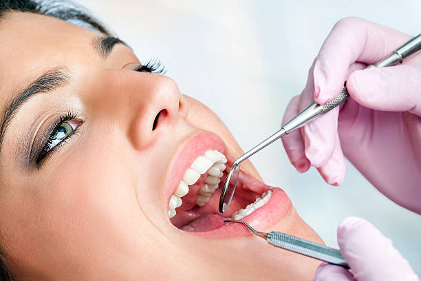 istock Young girl having dental check up 508099991