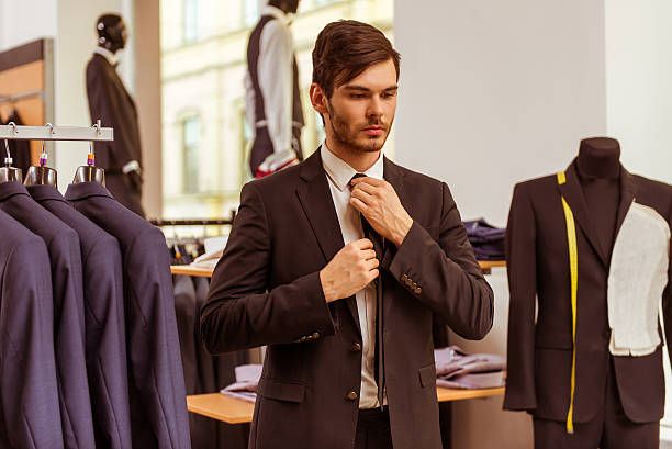istock People in suit shop 508100092
