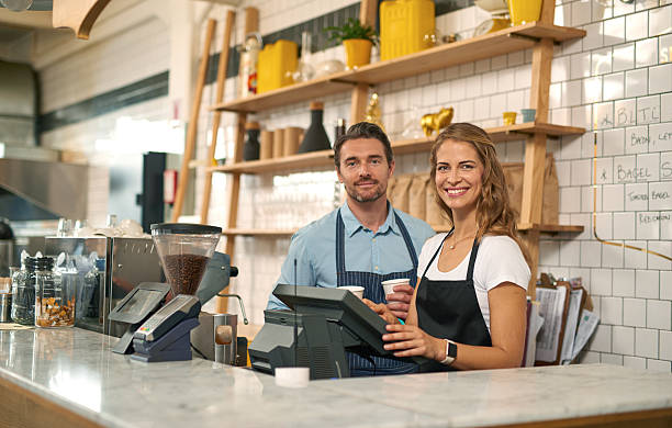 istock Two baristas working in coffee shop 508100502
