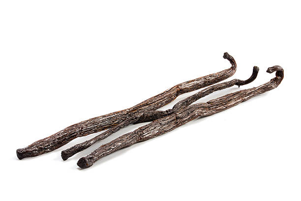 istock Three vanilla pods isolated with shadows on a white background 508101378