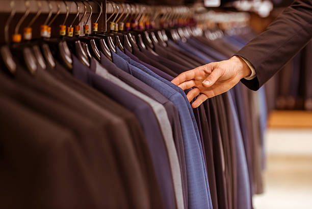 istock People in suit shop 508101500