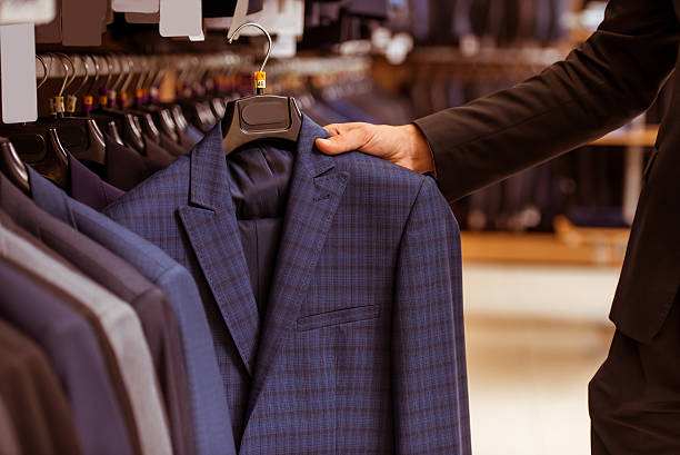 People in suit shop