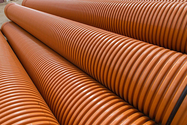 istock Stacked plastic pipes - Tuberias de material Plastico Apiladas 508102068