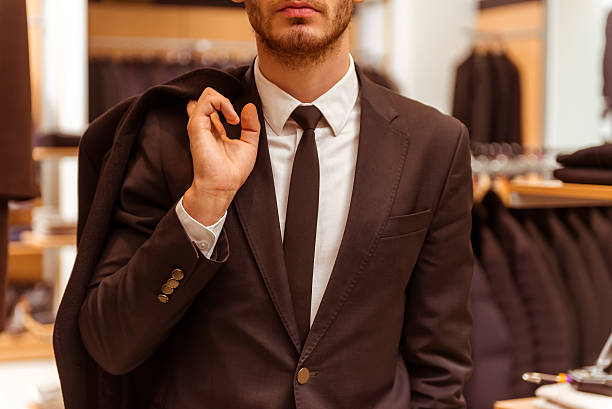 istock People in suit shop 508104374