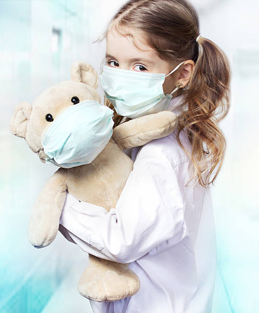 istock Child girl protective mask virus protection concept. 508105412