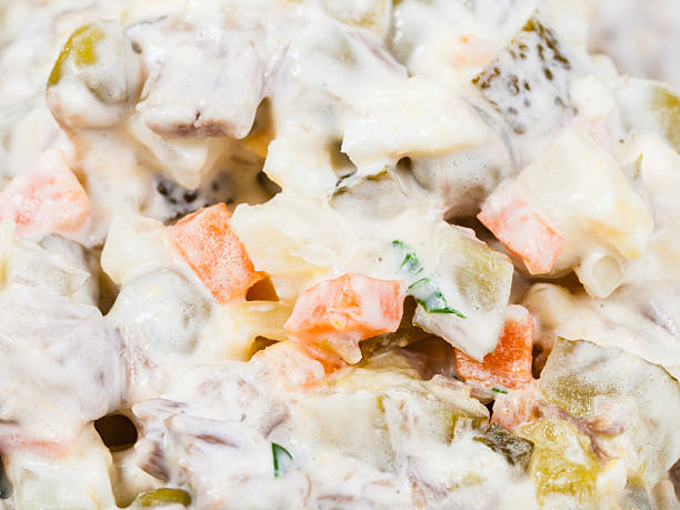istock russian salad dressed with mayonnaise close up 508106728