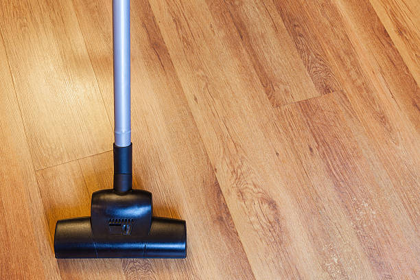 istock front view vacuuming of laminate by vacuum cleaner 508107696