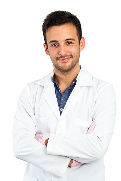 Young Male dentist isolated on white.