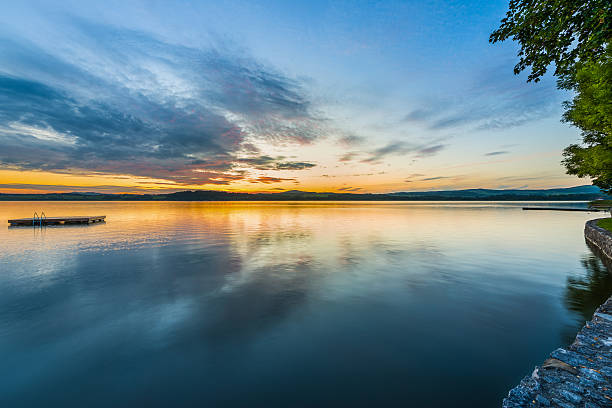 istock blue golden sunset at lake wallersee with reflection in water 508121179