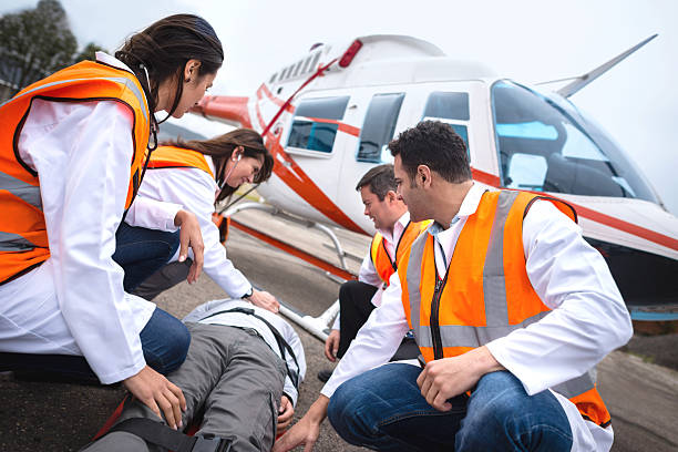 paramedics on an air ambulance - transport helicopter 뉴스 사진 이미지