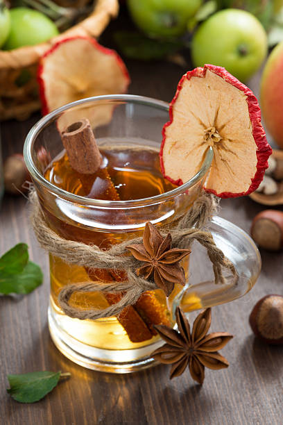 istock apple cider with spices in glass mug, close-up 508122729