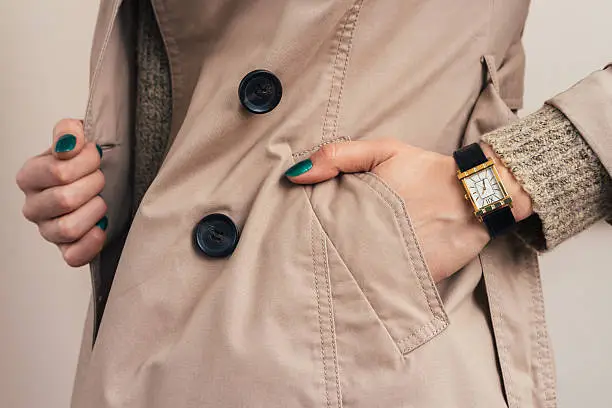 Photo of Woman put her hand in coat pocket