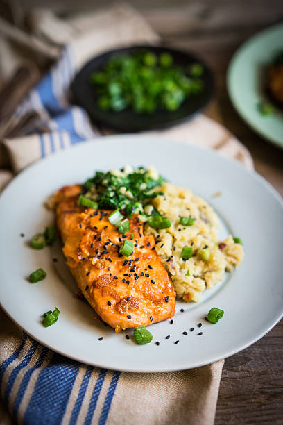 istock Salmon steak with mashed potatoes and greens 508126362