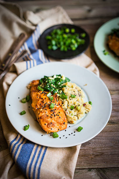 istock Salmon steak with mashed potatoes and greens 508127042