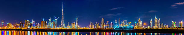 Night panorama of Dubai Downtown - the UAE Night panorama of Dubai Downtown - the UAE dubai skyline stock pictures, royalty-free photos & images