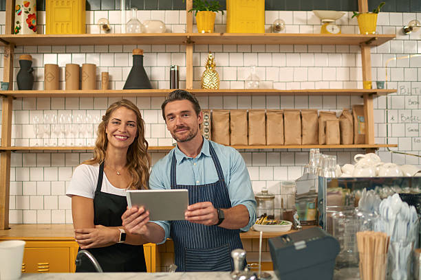 istock Baristas using digital tablet in coffee shop 508127568