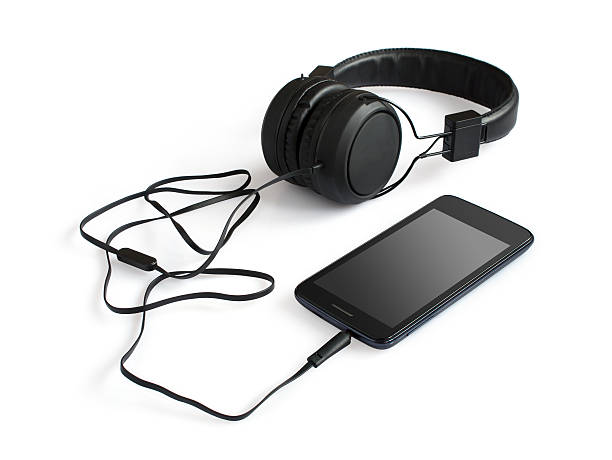 istock Black smartphone and headphones 508127738