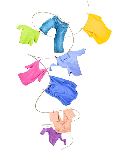 istock Laundry line with clothes isolated on white background 508128930