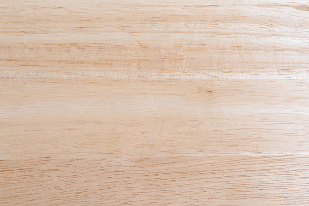 A clean wood glued table top illuminated with natural light.