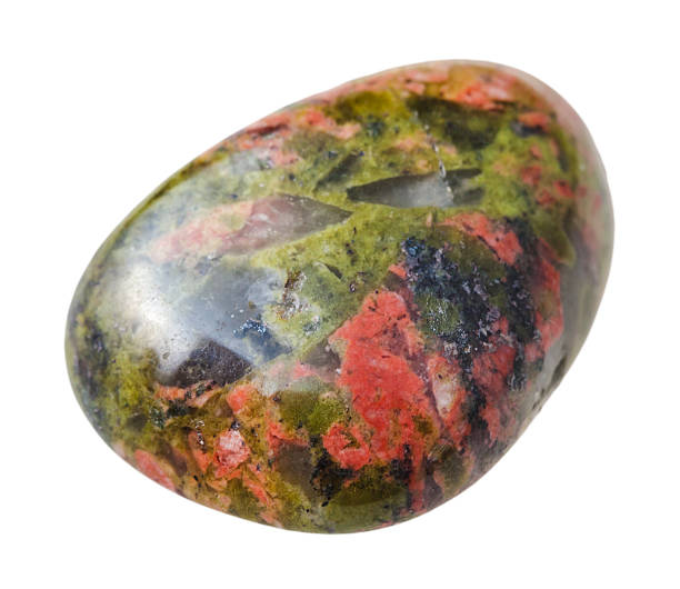 istock tumbled Unakite gemstone isolated on white 508130836